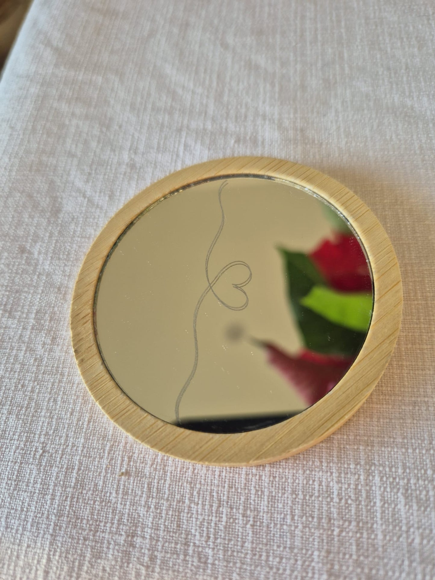 Miroir de poche gravé